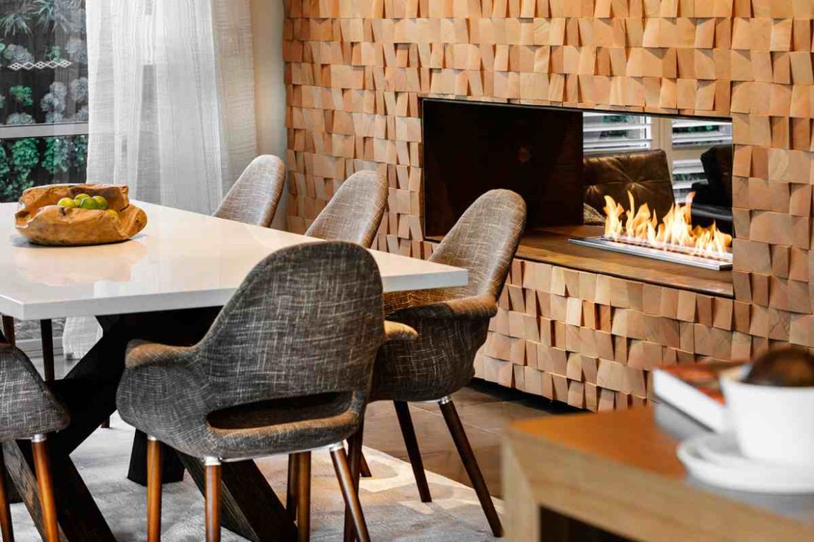 dining table in front of fireplace is the best way to design